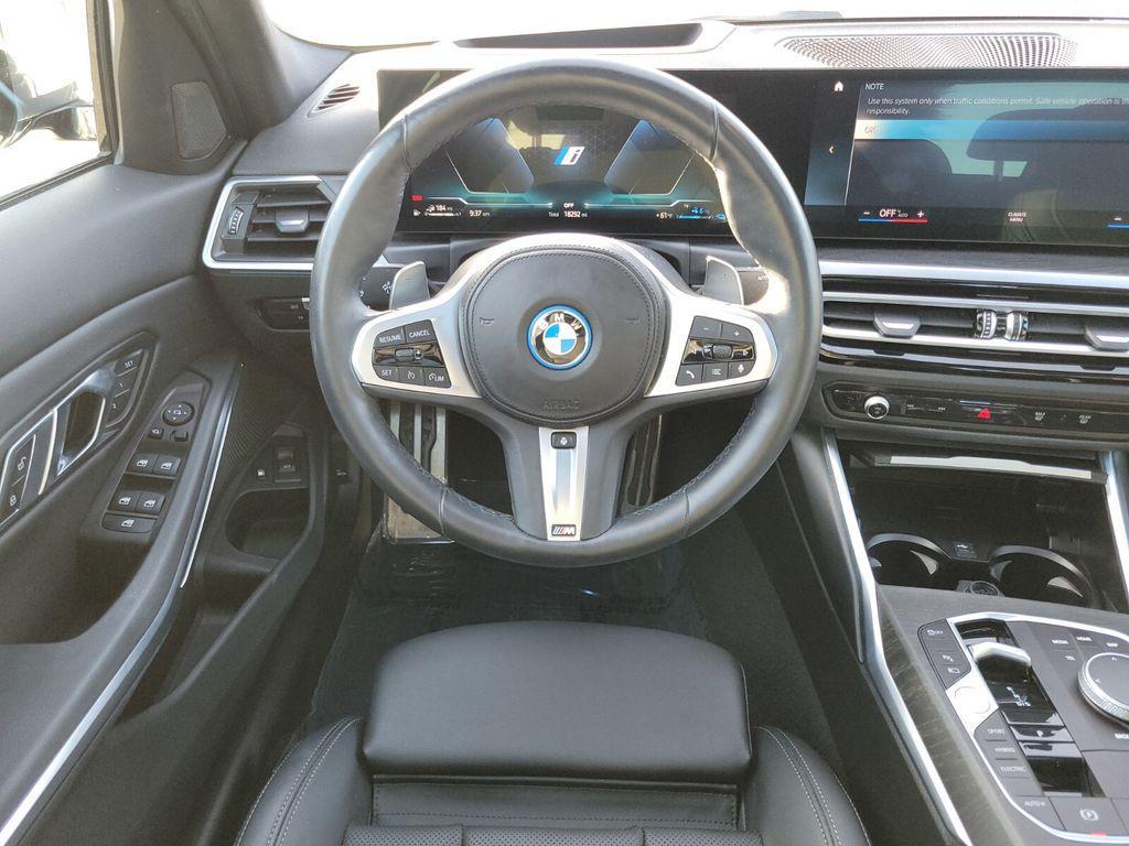 used 2023 BMW 330e car, priced at $39,199