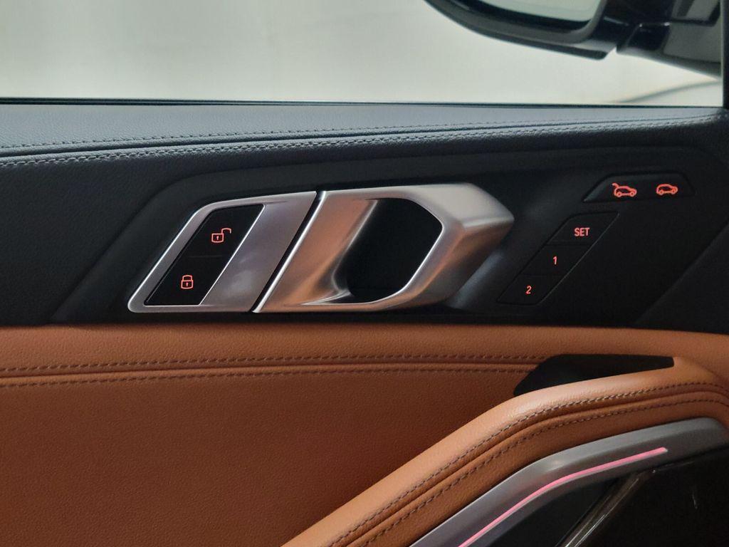 used 2022 BMW X6 car, priced at $54,296