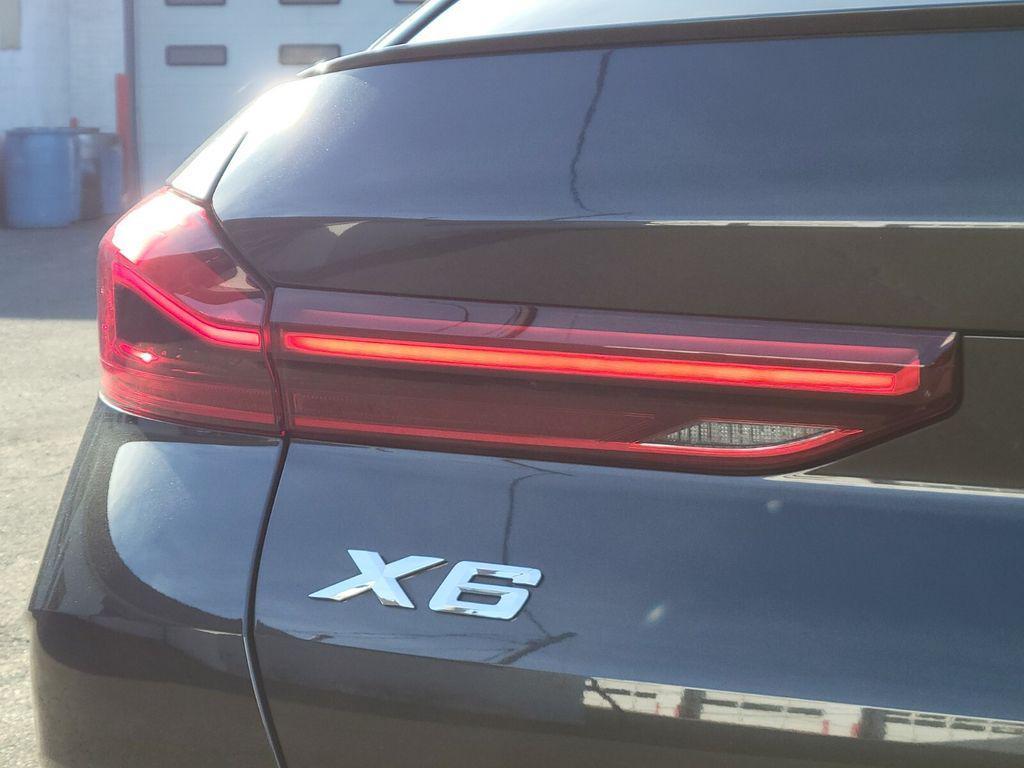 used 2023 BMW X6 car, priced at $52,193