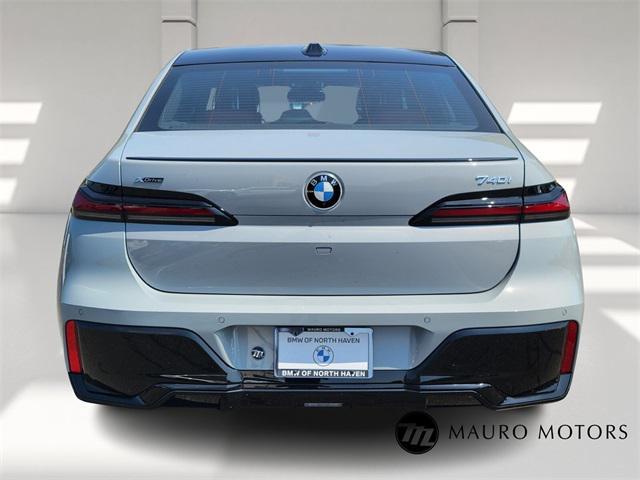 new 2025 BMW 740 car, priced at $104,055