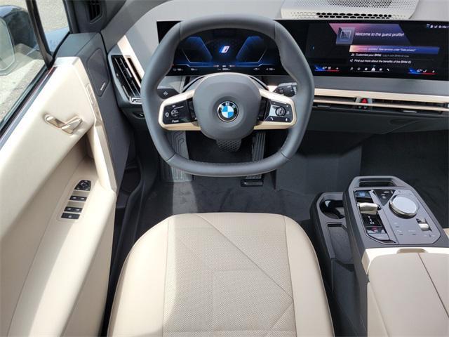 new 2026 BMW iX car, priced at $96,225