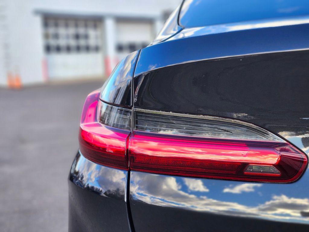used 2023 BMW X4 car, priced at $45,993