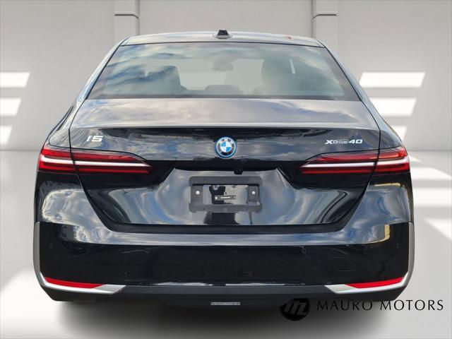 used 2025 BMW i5 car, priced at $65,670