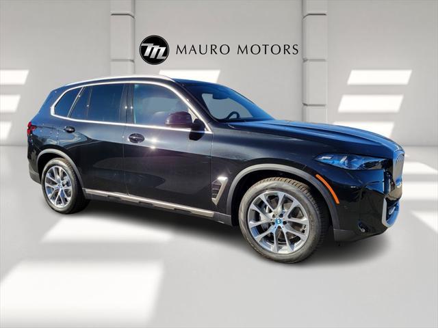 new 2025 BMW X5 PHEV car, priced at $78,085