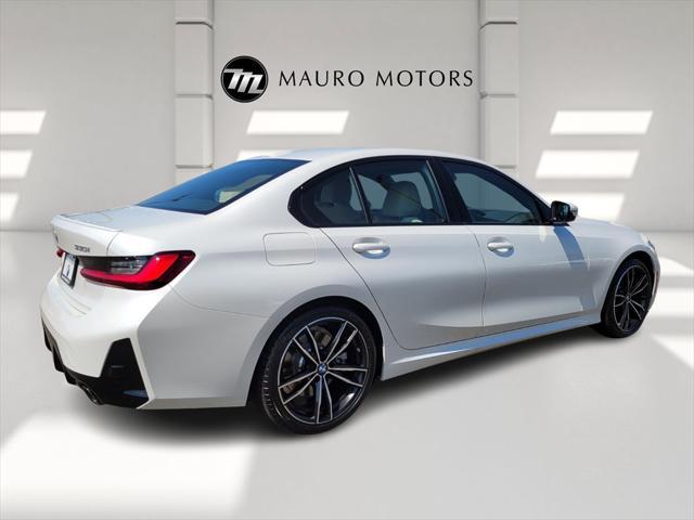 new 2024 BMW 330 car, priced at $53,460