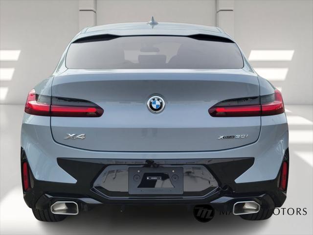 used 2025 BMW X4 car, priced at $64,910