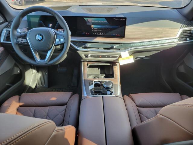 used 2025 BMW X5 PHEV car, priced at $73,510