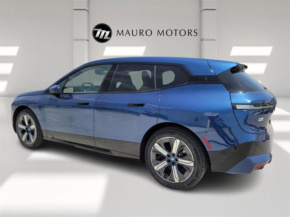 new 2025 BMW iX car, priced at $92,120