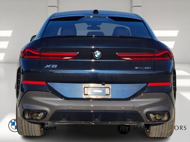 new 2025 BMW X6 car, priced at $84,745