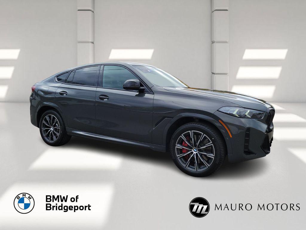 used 2024 BMW X6 car, priced at $77,179
