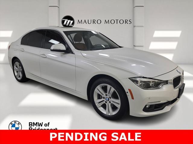 used 2018 BMW 330 car, priced at $19,999