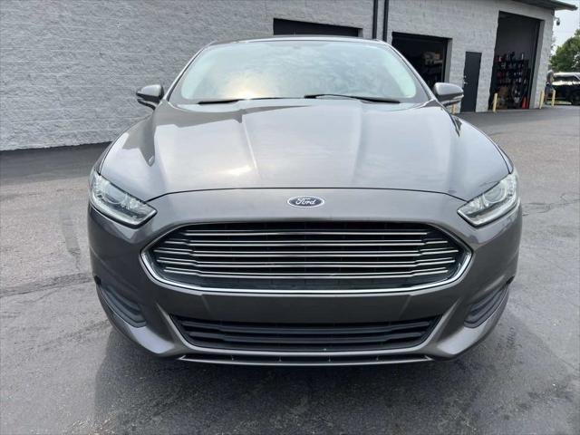 used 2014 Ford Fusion car, priced at $12,995