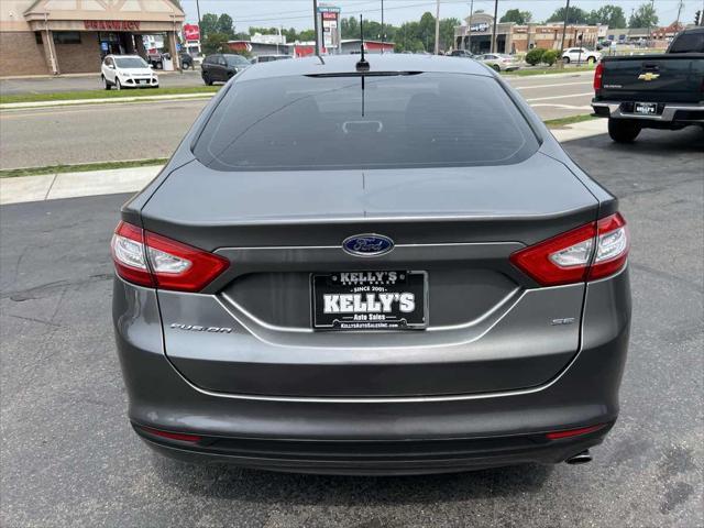 used 2014 Ford Fusion car, priced at $12,995