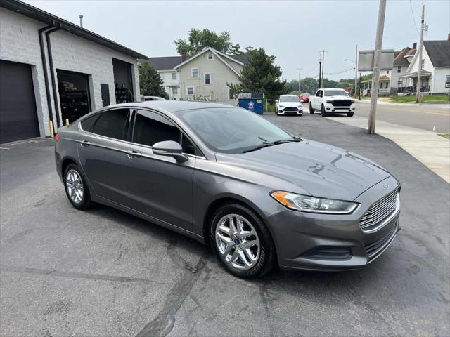 used 2014 Ford Fusion car, priced at $12,995