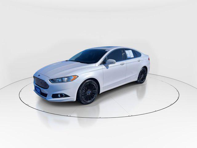 used 2016 Ford Fusion car, priced at $12,900