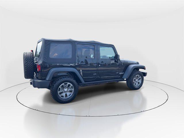 used 2014 Jeep Wrangler Unlimited car, priced at $23,297