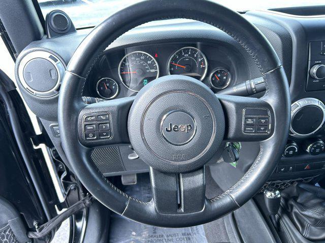 used 2014 Jeep Wrangler Unlimited car, priced at $23,297