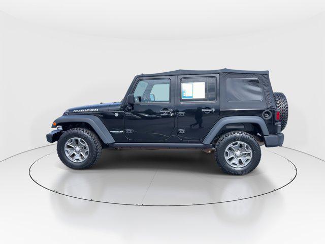 used 2014 Jeep Wrangler Unlimited car, priced at $23,297
