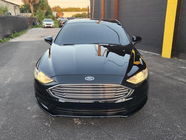 used 2018 Ford Fusion car, priced at $11,897