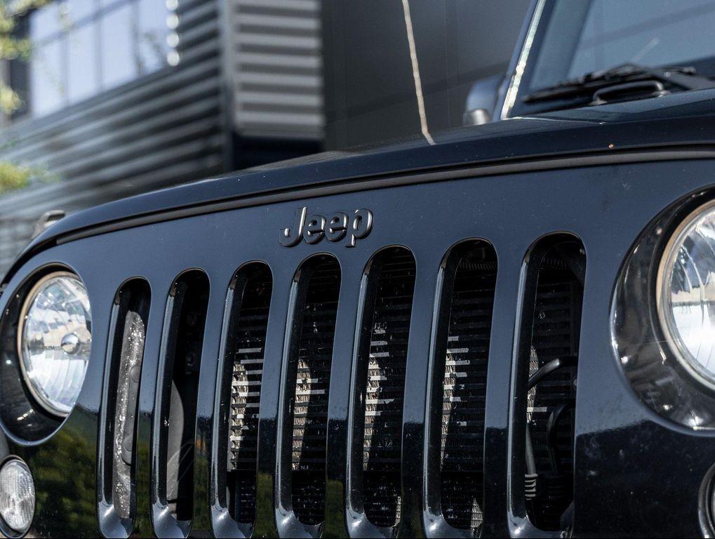 used 2018 Jeep Wrangler JK car, priced at $19,451
