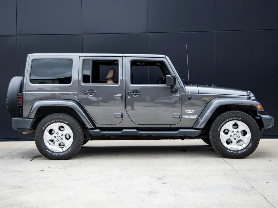 used 2014 Jeep Wrangler Unlimited car, priced at $18,491