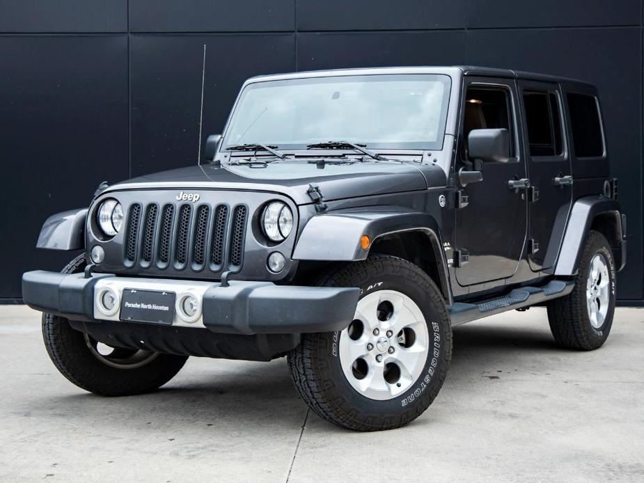 used 2014 Jeep Wrangler Unlimited car, priced at $21,491