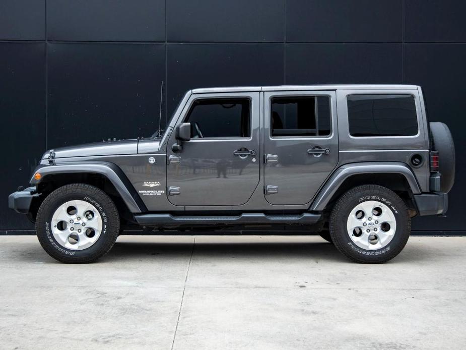 used 2014 Jeep Wrangler Unlimited car, priced at $20,991