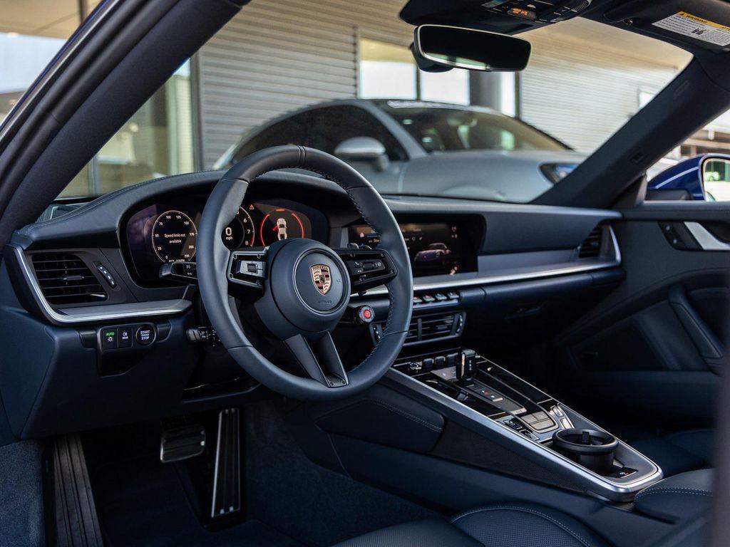 new 2026 Porsche 911 car, priced at $208,540