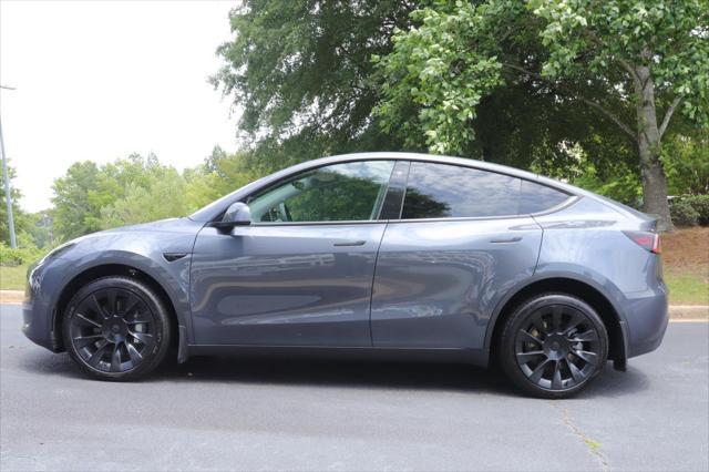 used 2023 Tesla Model Y car, priced at $32,998