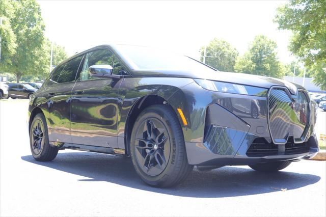 new 2026 BMW iX car, priced at $82,595