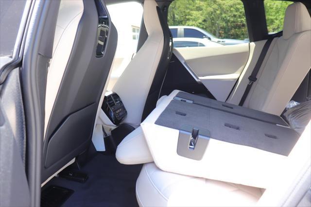 new 2026 BMW iX car, priced at $82,595