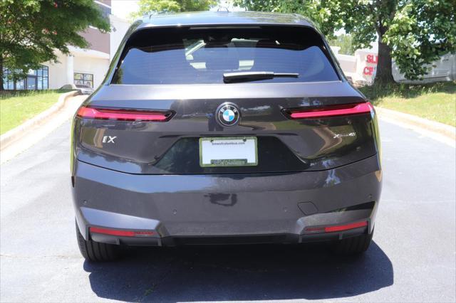 new 2026 BMW iX car, priced at $82,595