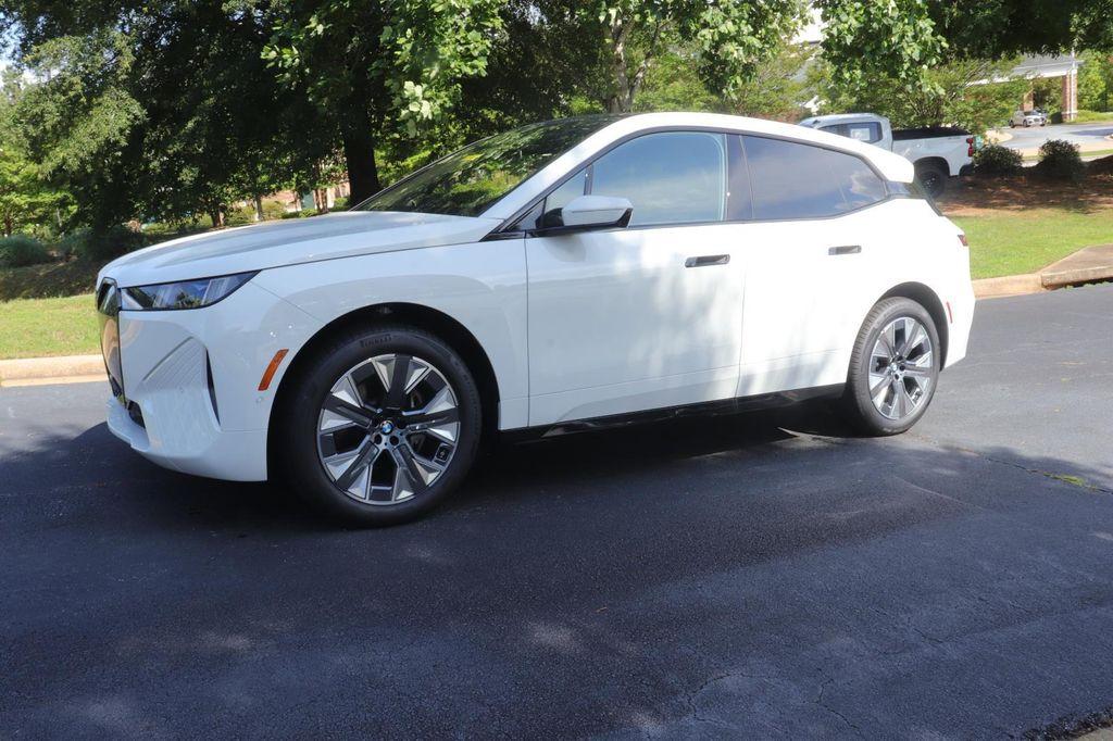 new 2026 BMW iX car, priced at $98,095