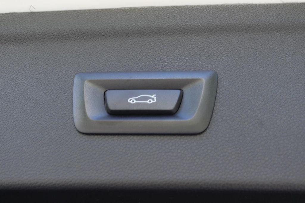 new 2026 BMW iX car, priced at $98,095