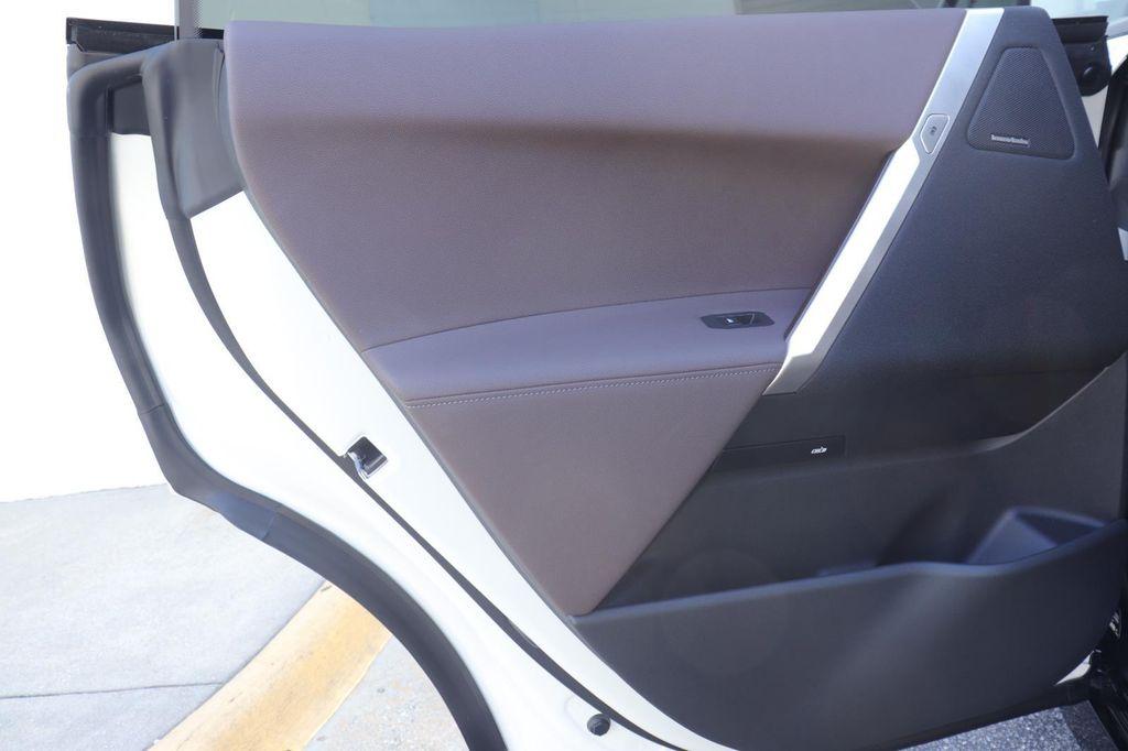 new 2026 BMW iX car, priced at $98,095