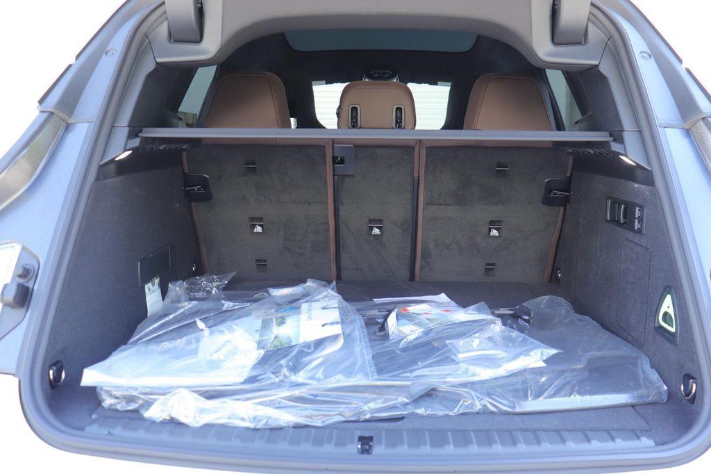 new 2026 BMW iX car, priced at $98,095