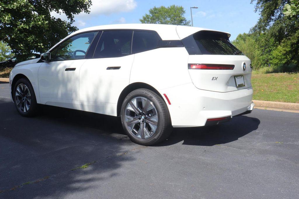 new 2026 BMW iX car, priced at $98,095
