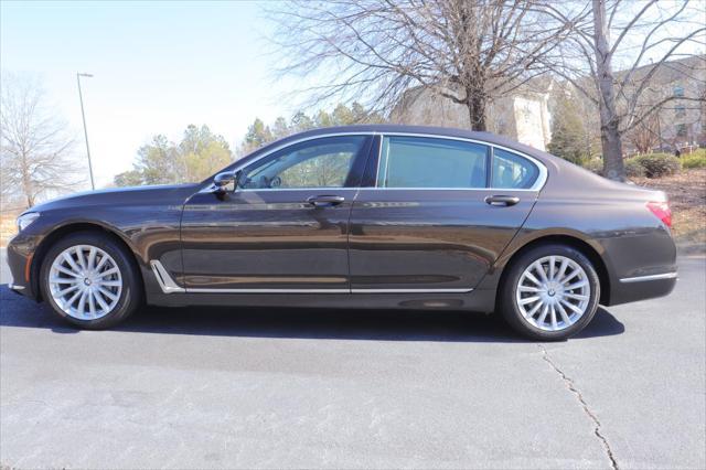 used 2016 BMW 740 car, priced at $28,466