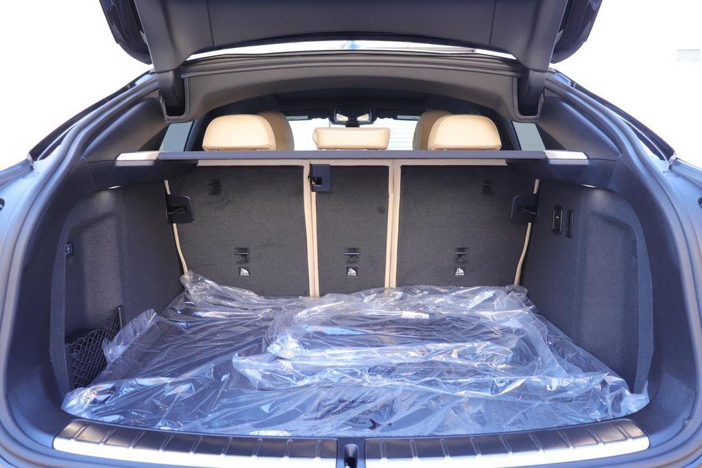 new 2025 BMW X4 car, priced at $61,670