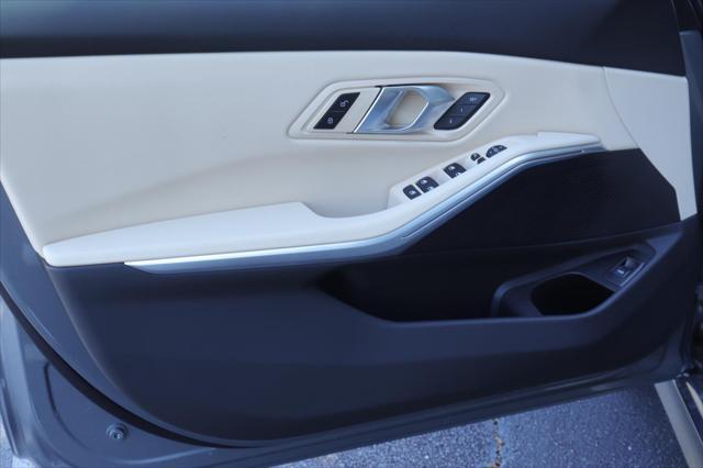 new 2025 BMW 330 car, priced at $50,125