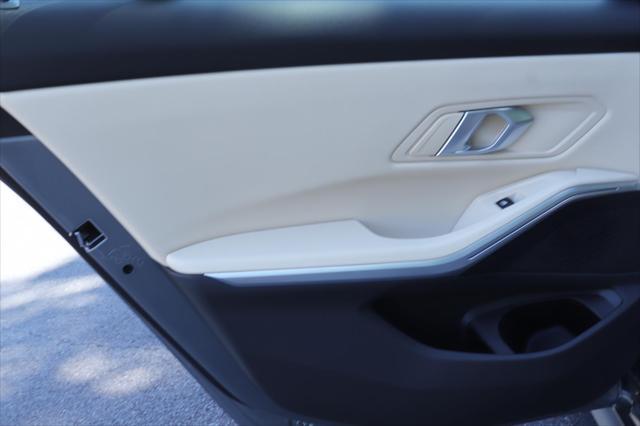 new 2025 BMW 330 car, priced at $50,125