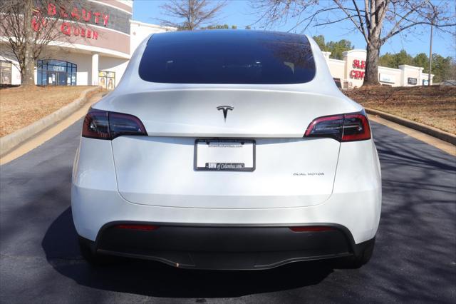 used 2023 Tesla Model Y car, priced at $32,996