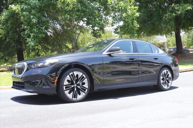new 2025 BMW 530 car, priced at $68,055