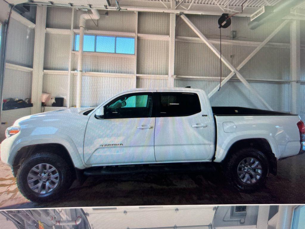 used 2019 Toyota Tacoma car, priced at $27,900