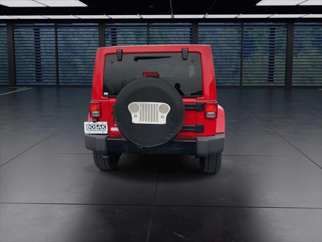 used 2014 Jeep Wrangler Unlimited car, priced at $18,498