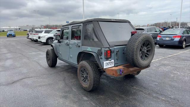 used 2014 Jeep Wrangler Unlimited car, priced at $9,961