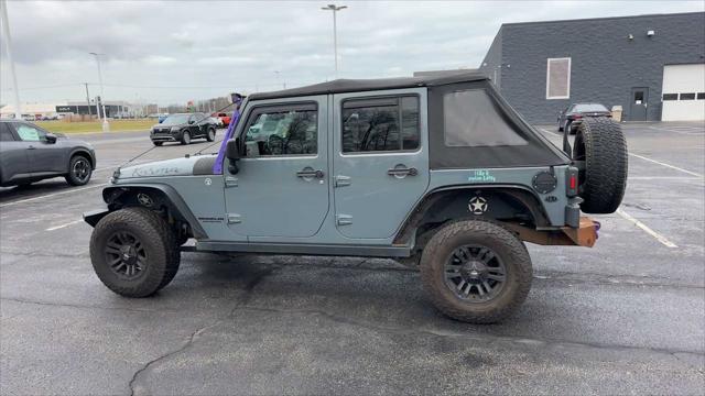 used 2014 Jeep Wrangler Unlimited car, priced at $9,961