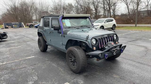 used 2014 Jeep Wrangler Unlimited car, priced at $9,961