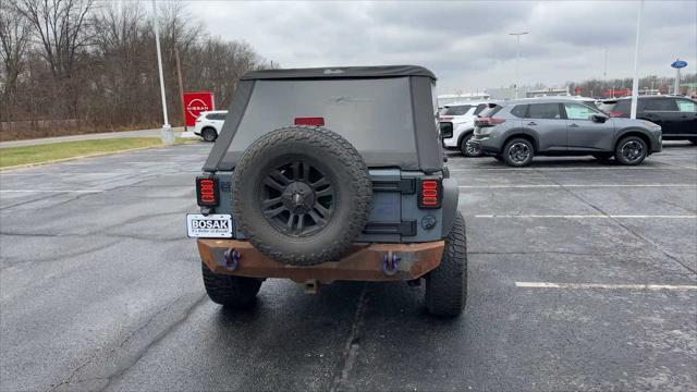 used 2014 Jeep Wrangler Unlimited car, priced at $9,961