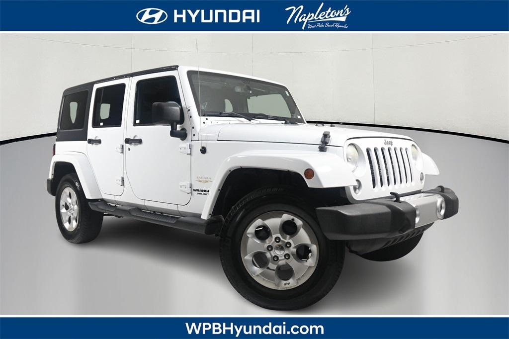 used 2014 Jeep Wrangler Unlimited car, priced at $21,153